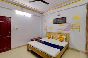 Postel nebo postele na pokoji v ubytování J C Guest House