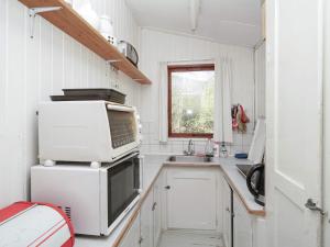 Kuhinja oz. manjša kuhinja v nastanitvi Holiday home Rørvig XIII