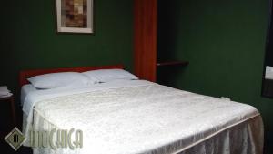 Letto o letti in una camera di Hostal Residencial Mochica