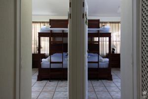 Punta LeonaにあるPunta Leona, Al Pairo 52の二段ベッド1組が備わる客室です。