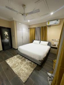 Katil atau katil-katil dalam bilik di Cloud9 Luxury Apartments