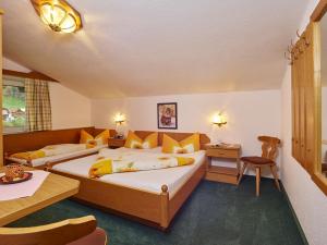Postel nebo postele na pokoji v ubytování Haus Anton Sölden - Apartments & Zimmer