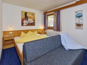 Postel nebo postele na pokoji v ubytování Haus Anton Sölden - Apartments & Zimmer