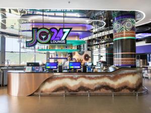 a jz lounge bar in a shopping mall at SOJO Hotel Lao Cai in Lao Cai
