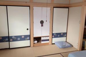 Voodi või voodid majutusasutuse 一番館※温泉街に近く、心が落ち着く別荘地同樺順荘 toas