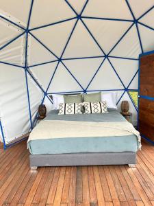 Glamping Altos De Hayuelos客房内的一张或多张床位