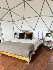 Glamping Altos De Hayuelos客房内的一张或多张床位