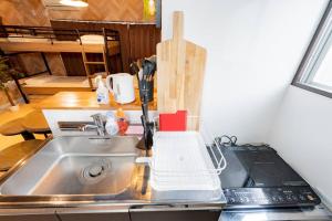 Virtuvė arba virtuvėlė apgyvendinimo įstaigoje AIC池袋502