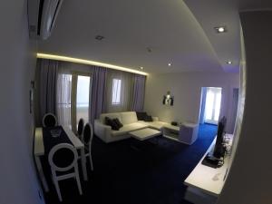 Postel nebo postele na pokoji v ubytování Apartments M Palace