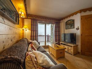 Televízia a/alebo spoločenská miestnosť v ubytovaní Appartement cosy à Tignes · Proche pistes & commerces · Balcon · 4 pers. · 3*** - FR-1-502-392