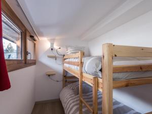 Posteľ alebo postele v izbe v ubytovaní Appartement duplex au centre de Chamonix avec WiFi et parking - FR-1-343-189