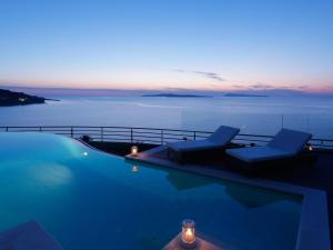 Gallery image of Pictures Suites in Agios Stefanos +54 photos