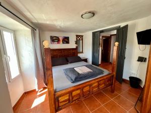 Кровать или кровати в номере Spanish Town House