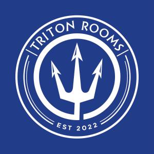 un logotipo para el equipo de tritones itinerantes en Triton Rooms en Lefkandi Chalkidas