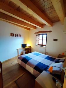 Postel nebo postele na pokoji v ubytování La Gándara Casa Rural