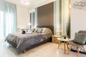 מיטה או מיטות בחדר ב-Beautiful City Rooms close to Acropolis