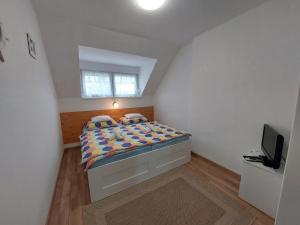Posteľ alebo postele v izbe v ubytovaní Golden Beach apartments