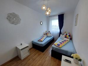 Posteľ alebo postele v izbe v ubytovaní Golden Beach apartments