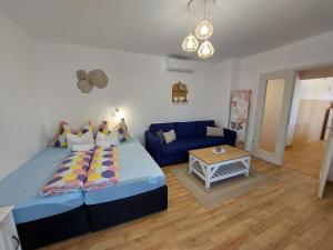 Posteľ alebo postele v izbe v ubytovaní Golden Beach apartments