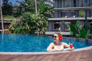 Bazén v ubytování Plataran Ubud Hotel & Spa - CHSE Certified nebo v jeho okolí
