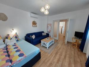 Posteľ alebo postele v izbe v ubytovaní Golden Beach apartments