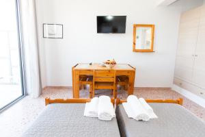 Postel nebo postele na pokoji v ubytování MariRena Plaz