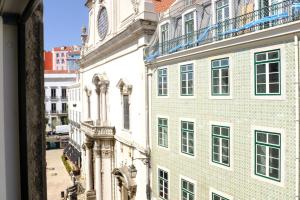 a view from a window of a building at Liberator Rossio in Lisbon