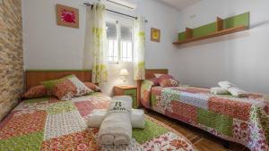 Postel nebo postele na pokoji v ubytování Casa Rural El Viso Rute by Ruralidays