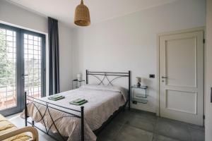 Posteľ alebo postele v izbe v ubytovaní Il Lampin B&B