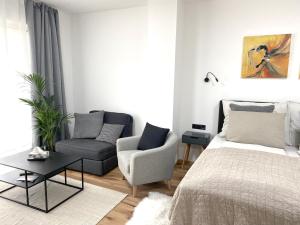 Posezení v ubytování Apartments Loim Lodge