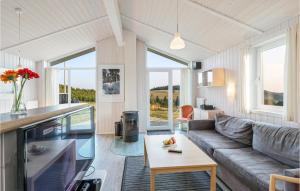 a living room with a couch and a table at St, Andreasberg, Haus 29 in Sankt Andreasberg