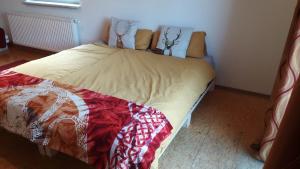 A bed or beds in a room at Appartement Rose