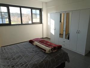מיטה או מיטות בחדר ב-Oxford Apart Otel