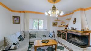 Część wypoczynkowa w obiekcie Villa Rural Paquete Pozo Alcón by Ruralidays