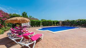 a group of chairs and a swimming pool at Casa Azahar Jimena de la Frontera by Ruralidays in Jimena de la Frontera