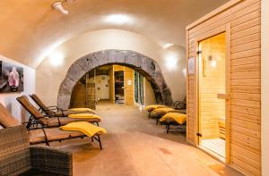 A seating area at Hotel Grand Vígľaš