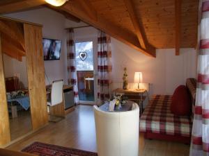 Uma área de estar em Hotel Gletschermühle