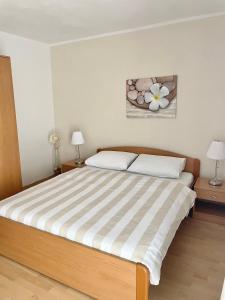 Postel nebo postele na pokoji v ubytování Apartment Araucaria