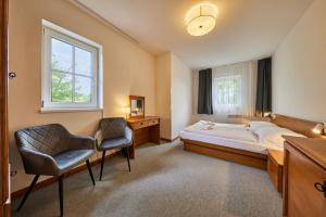 Postel nebo postele na pokoji v ubytování Hotel Auri