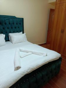 Katil atau katil-katil dalam bilik di Luxurious 2bedroom furnished apartment