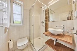 Koupelna v ubytování Hotel Auri