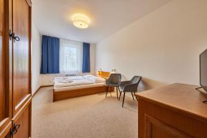 Postel nebo postele na pokoji v ubytování Hotel Auri