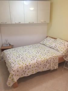 Postel nebo postele na pokoji v ubytování Apartment Ela