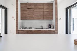 Η κουζίνα ή μικρή κουζίνα στο Lamia del Lupo by Rentbeat