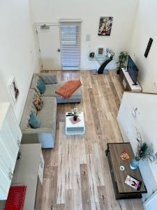 an overhead view of a living room with a couch at Hollywood Loft Modern Style 1 Bedroom in Los Angeles