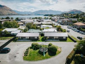 an aerial view of a town with a lake at 4 - Charming Space, Just a Stone Throw from Central Wanaka in Wanaka