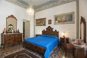 Postel nebo postele na pokoji v ubytování B&B Via Roma