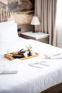 Postel nebo postele na pokoji v ubytování Hotel Royal Inn