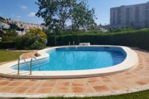 Basen w obiekcie Coqueto piso con Billar en Benalmadena Costa lub w pobliżu