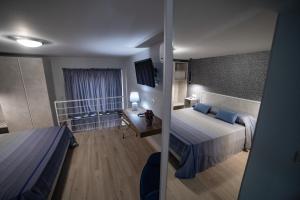 Katil atau katil-katil dalam bilik di Tropea City Home